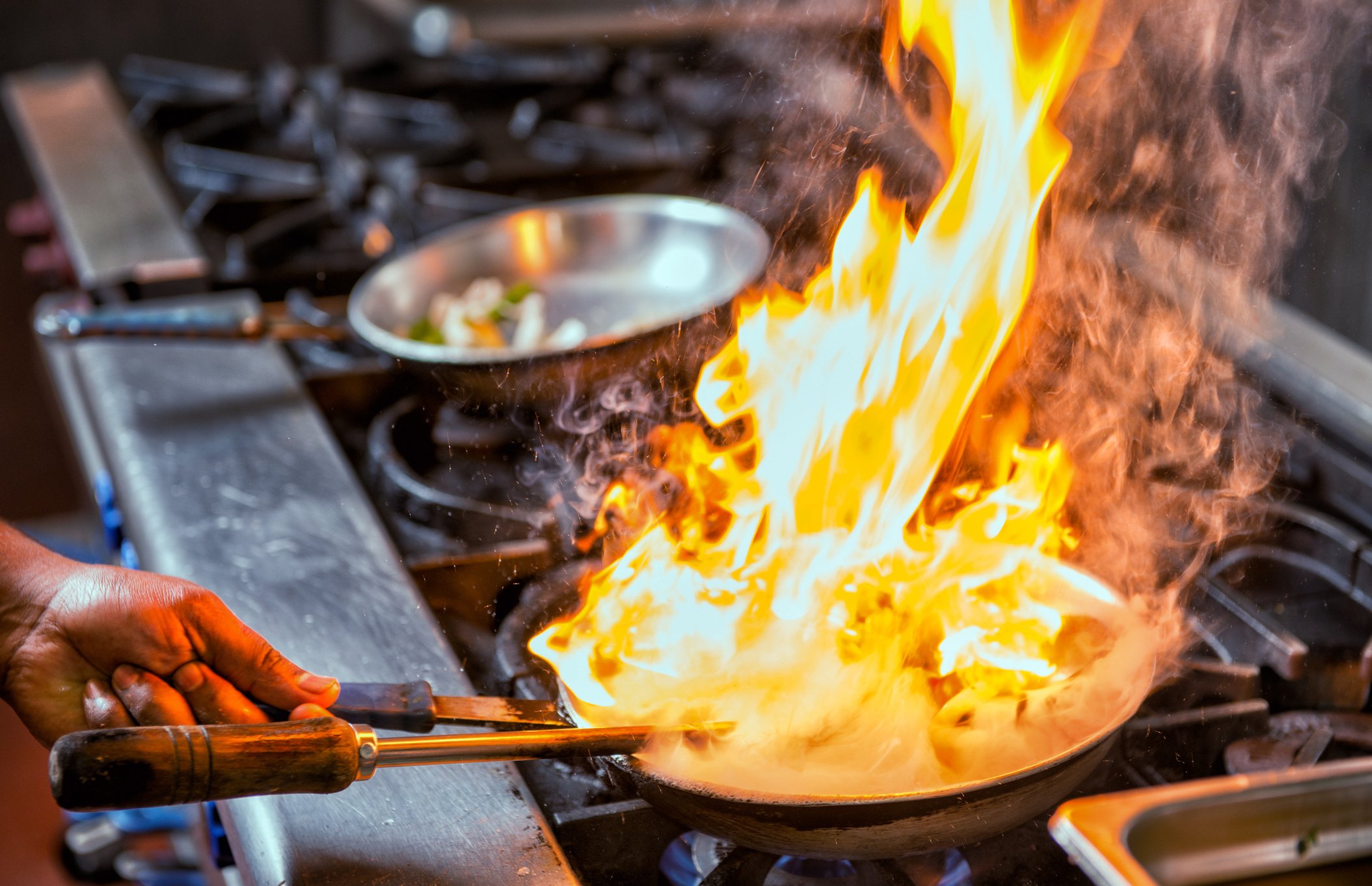 Flambe flame food frying pan